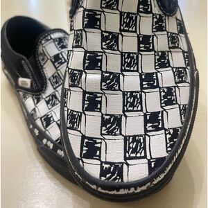 Women’s black&white checkboard Vans slip in shoes gently worn. SIZE 6.5